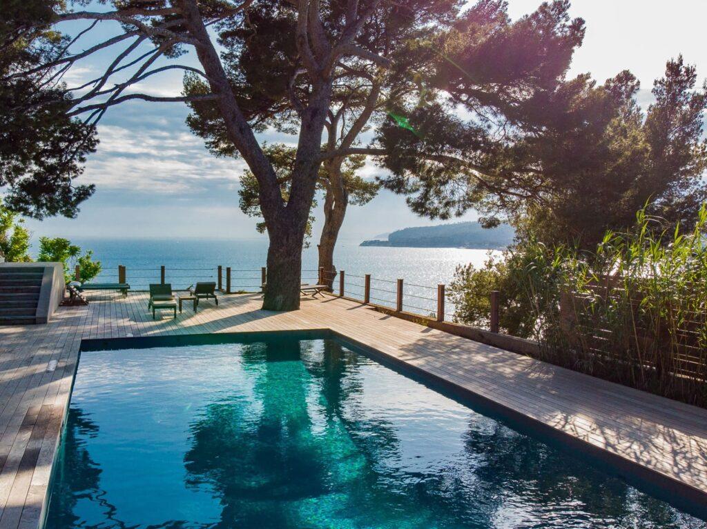 heated pool with Calanques cliff views at Villa L'instant, French Riviera