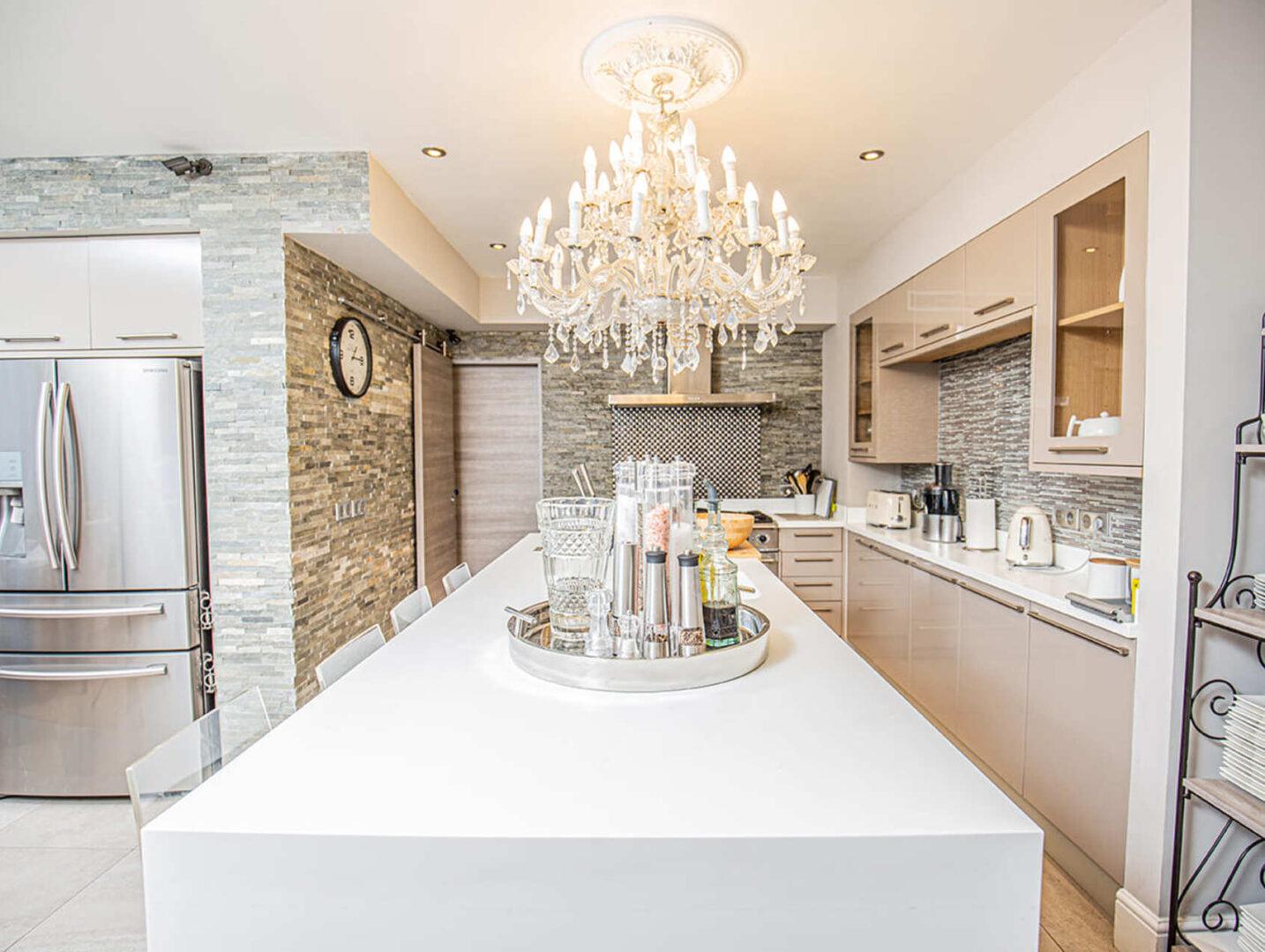 Luxury interior living room/kitchen/dining room at Villa Cap Élan, Cap d'Antibes