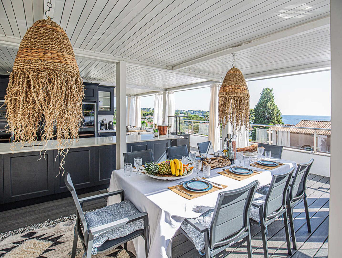 Outdoor lounge area and heated pool at Villa Cap Élan, Cap d'Antibes, Côte d'Azur