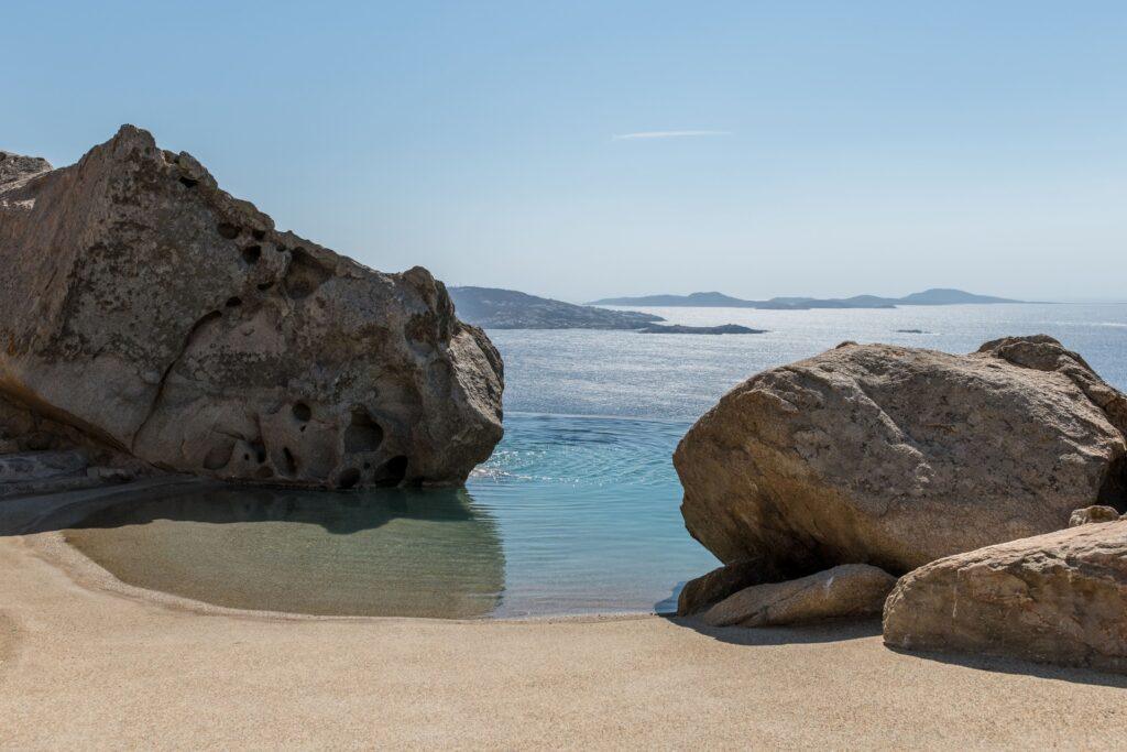 private infinity pool built into rock at Villa Nema, luxury villa Mykonos