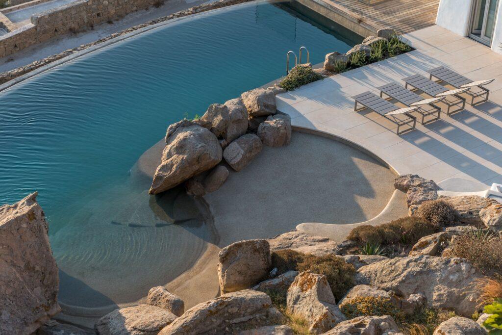 private infinity pool built into rock at Villa Nema, luxury villa Mykonos