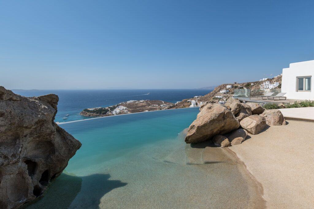 private infinity pool built into rock at Villa Nema, luxury villa Mykonos