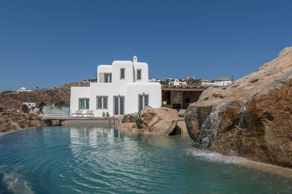 Villa Nema Mykonos luxury villa built into natural rock with infinity pool and Aegean views