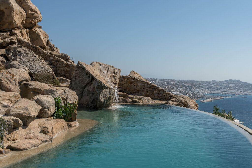 private infinity pool built into rock at Villa Nema, luxury villa Mykonos