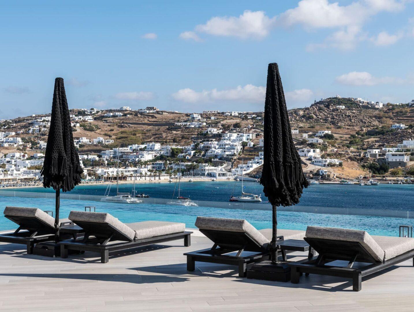 private sea dock and outdoor lounge at Vos Estate, seafront villa Mykonos