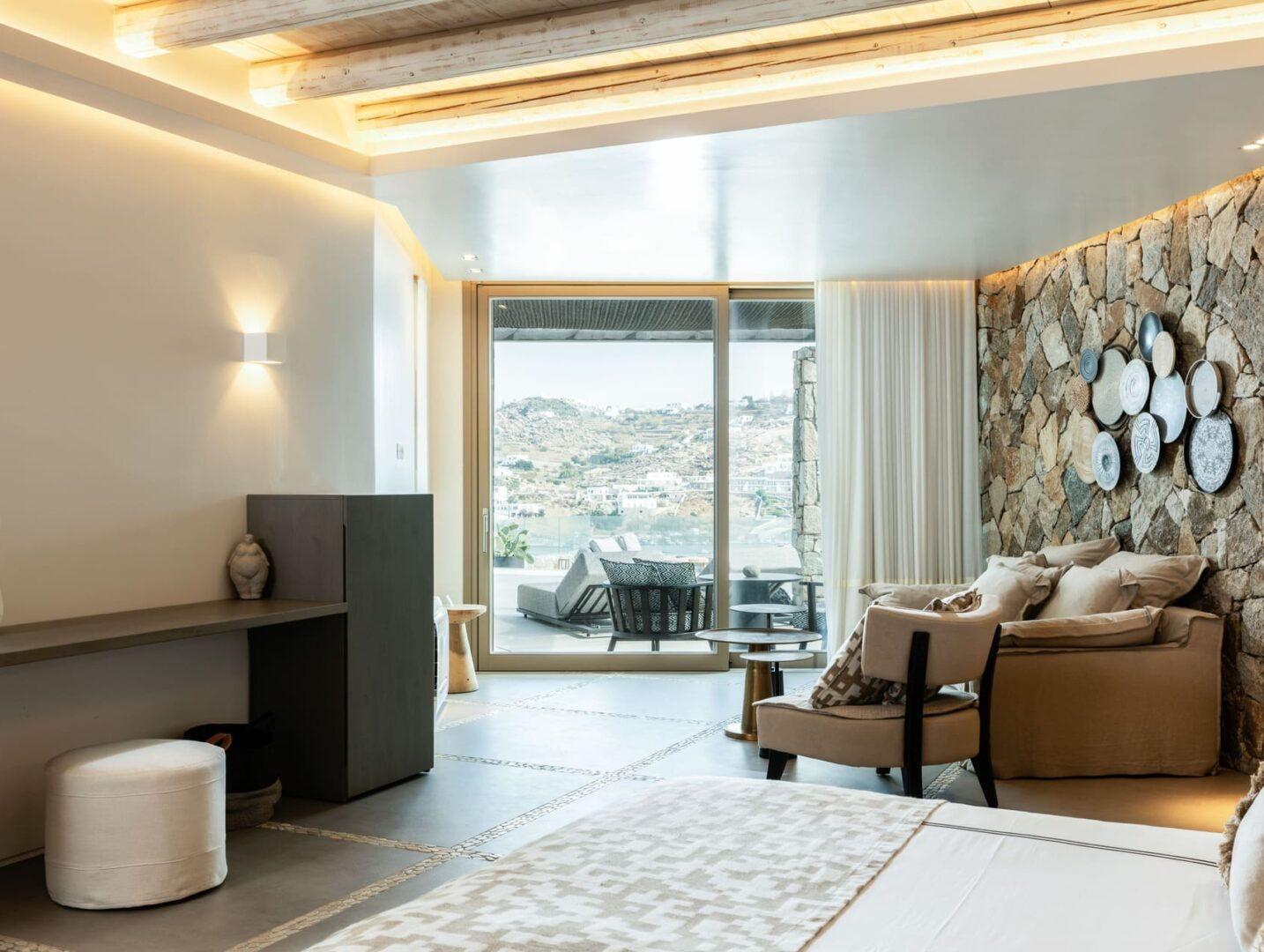 luxury en-suite bedroom with sea view at Vos Estate, 11-bedroom villa Mykonos