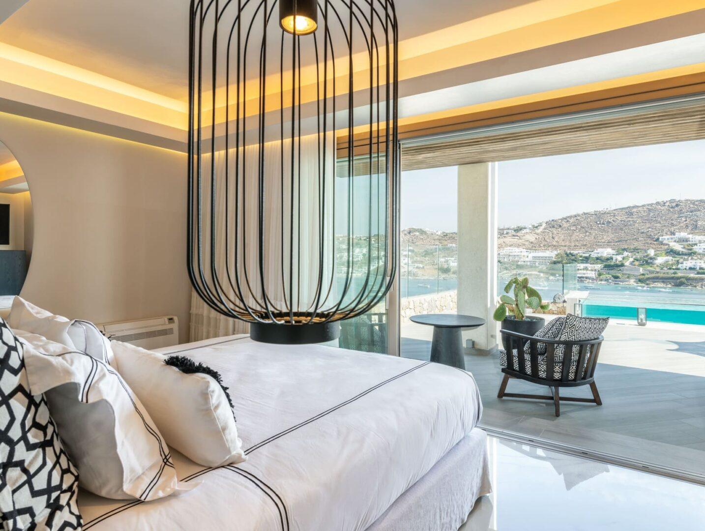 luxury en-suite bedroom with sea view at Vos Estate, 11-bedroom villa Mykonos
