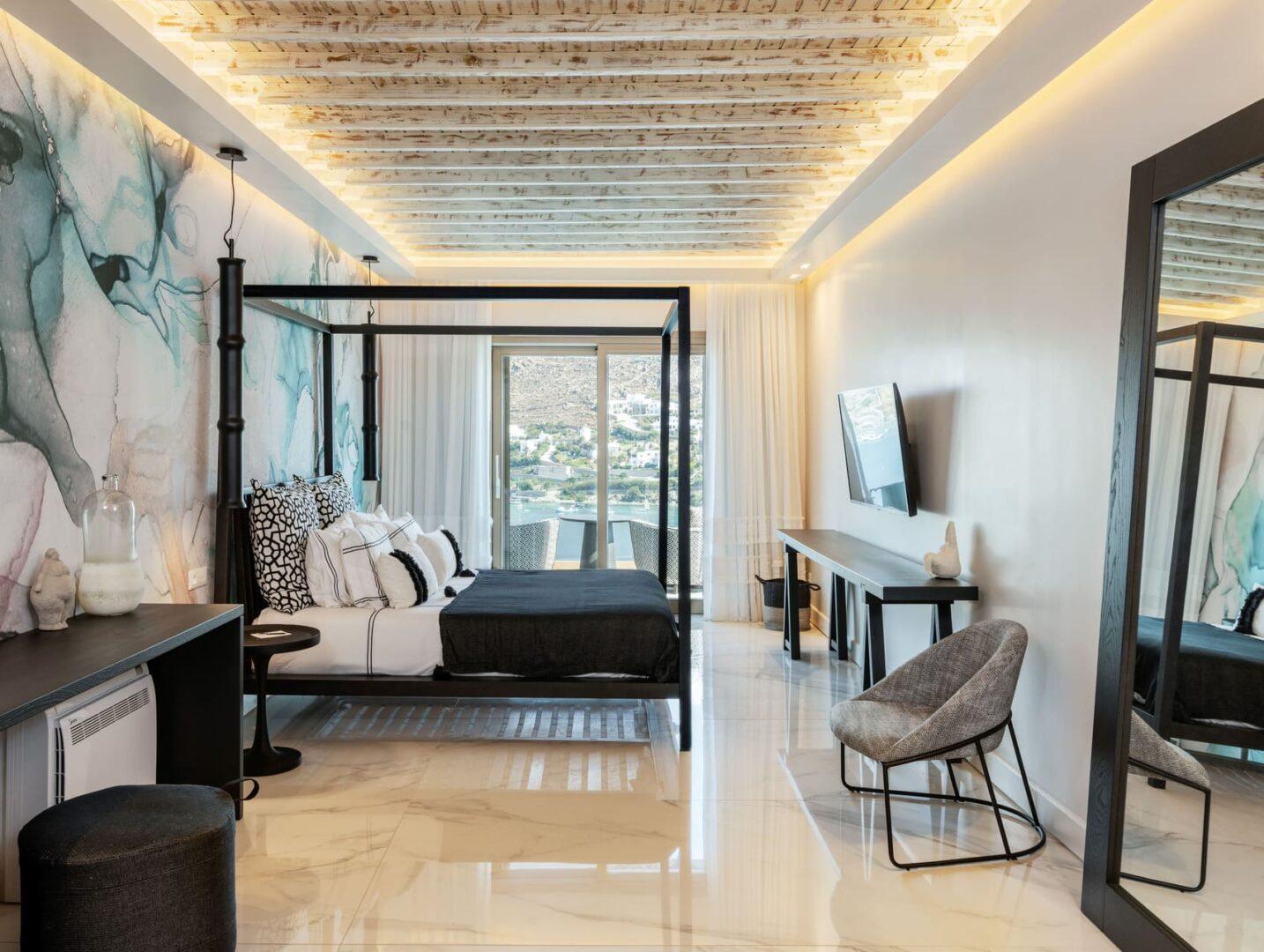 luxury en-suite bedroom with sea view at Vos Estate, 11-bedroom villa Mykonos