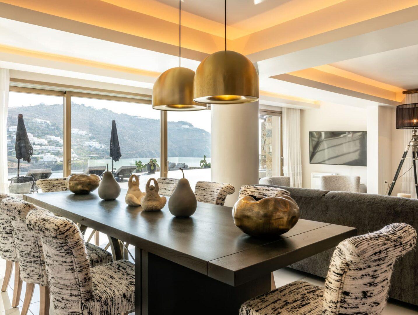 minimalist living and dining room at Vos Estate, luxury villa Mykonos