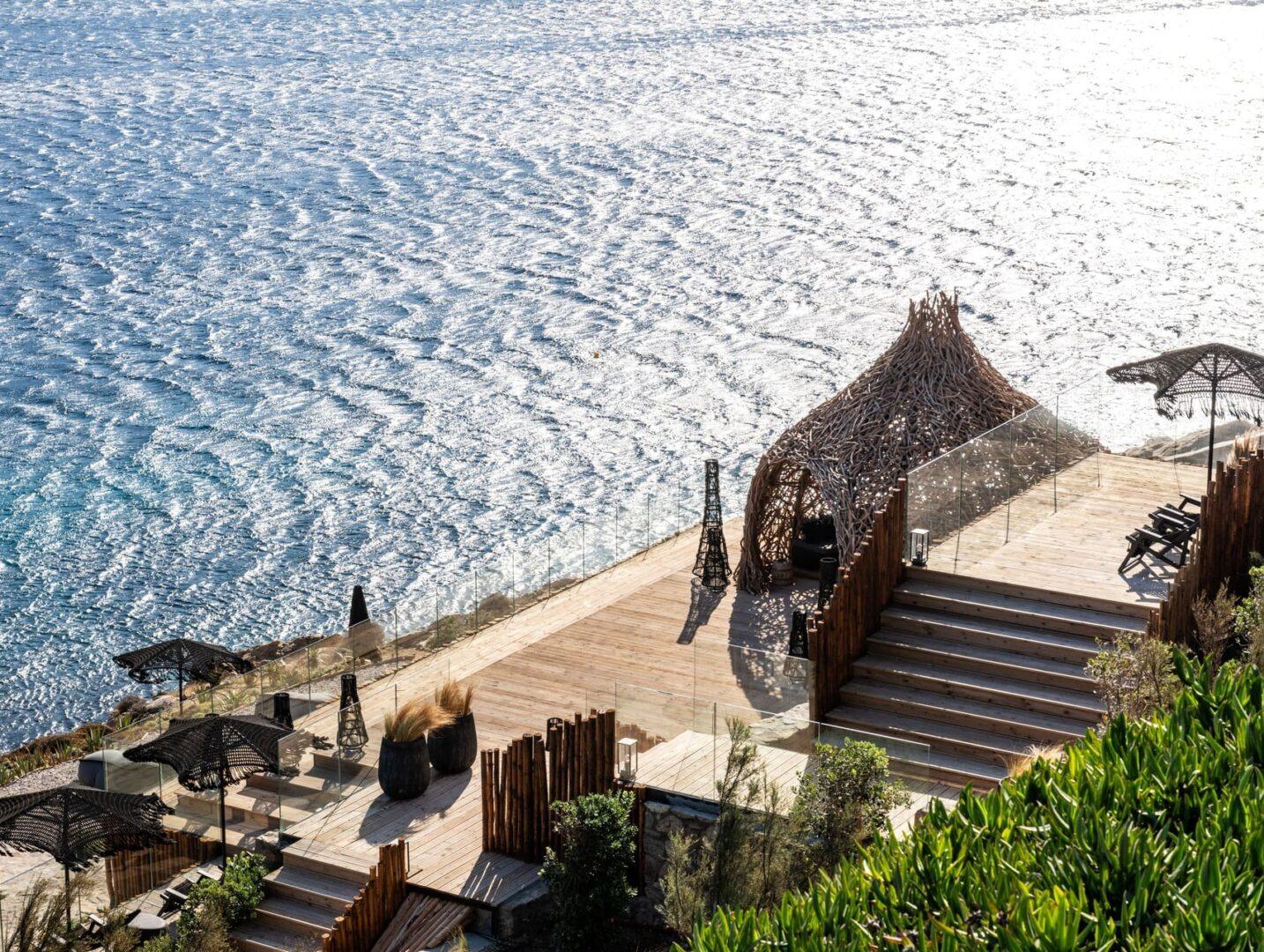 private sea dock and outdoor lounge at Vos Estate, seafront villa Mykonos